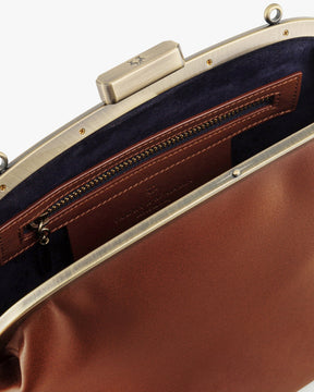 Sac EMMA Brun, vue intérieure détaillant le fermoir, la poche zippée et la doublure bleu marine