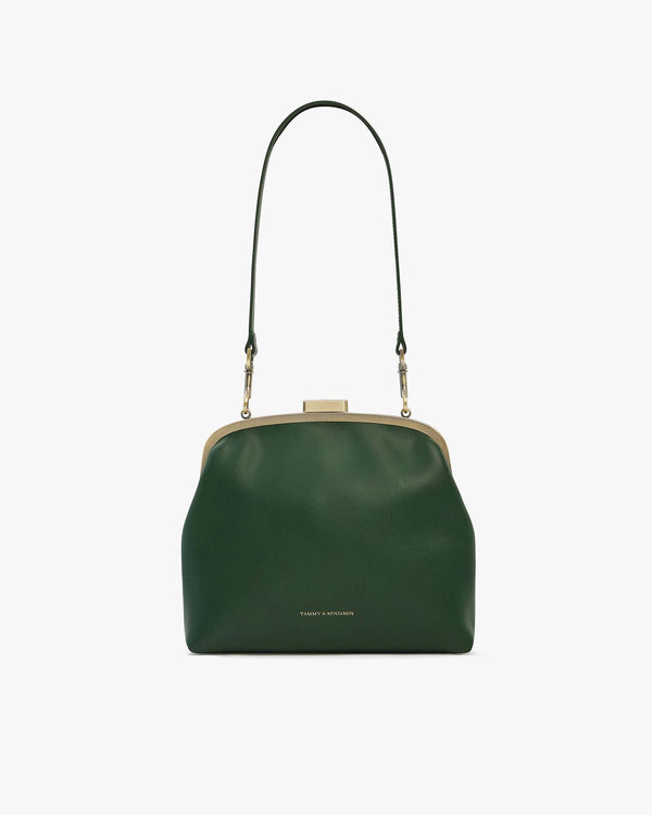 Sac EMMA vert émeraude de face, posé, fermoir doré apparent, bandoulière longue détachable