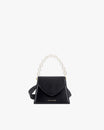 Sac GABRIELLE noir de face, posé, avec anse chaîne courte translucide détachable